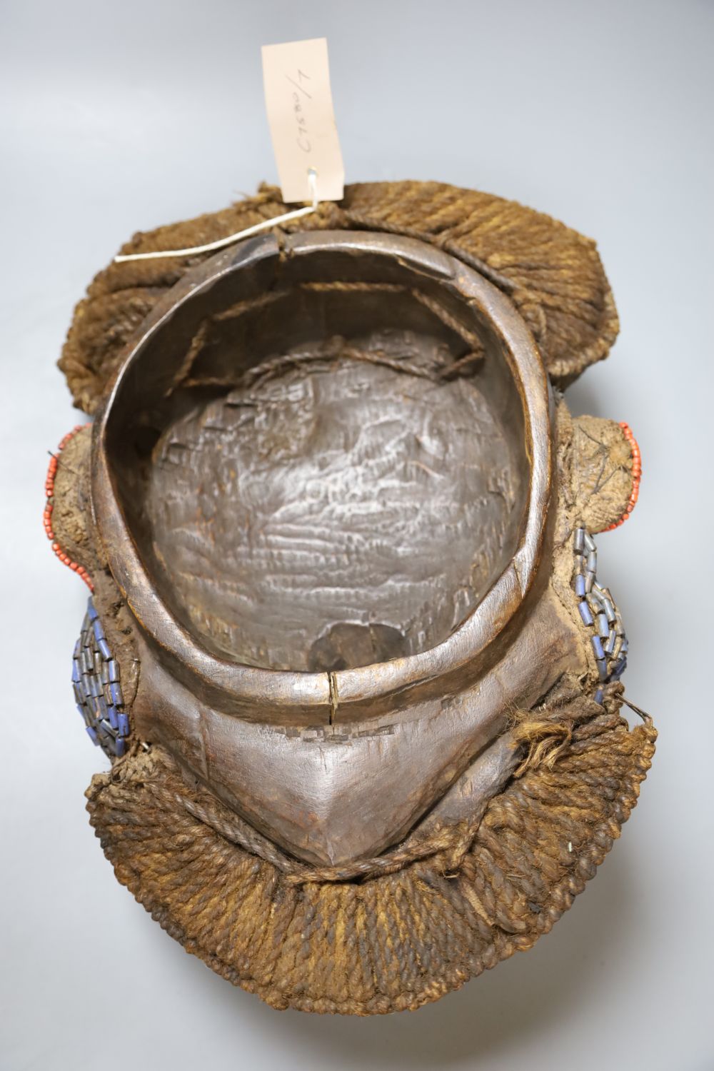 A Bamileke Kam Crest beadwork mask, Cameroon